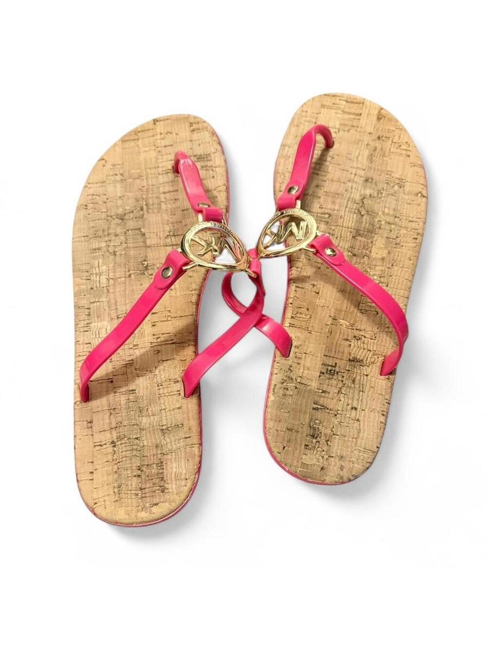 Michael Kors cork flip flops with pink trims and bottoms. size 8.5/9